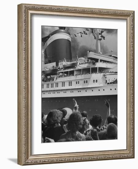 The Ship United States, under Flags, Going on First Trip, with Passengers Waving to Those on Shore-Frank Scherschel-Framed Photographic Print