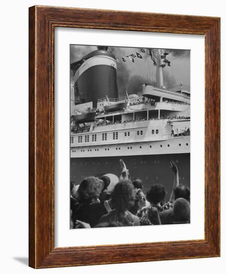 The Ship United States, under Flags, Going on First Trip, with Passengers Waving to Those on Shore-Frank Scherschel-Framed Photographic Print