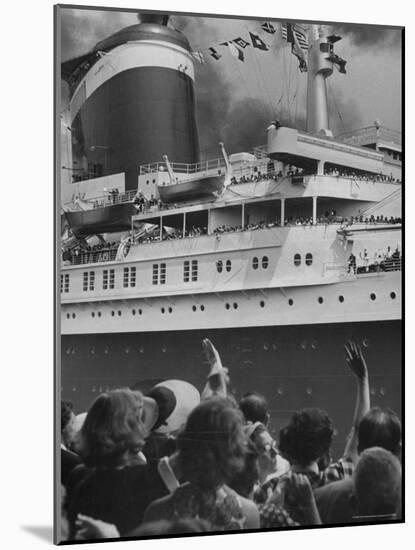 The Ship United States, under Flags, Going on First Trip, with Passengers Waving to Those on Shore-Frank Scherschel-Mounted Photographic Print