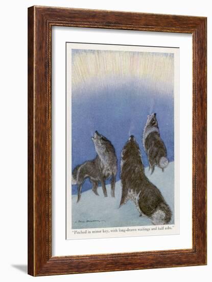 The Song of the Huskies: Howling Under the Aurora Borealis-Paul Bransom-Framed Art Print