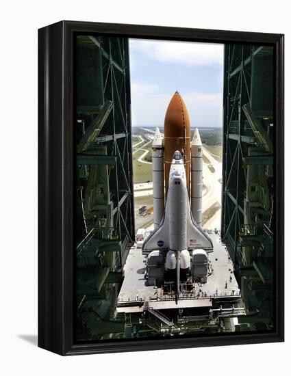 The Space Shuttle Discovery Begins Its Six Hour Trek from the Vehicle Assembly Building-null-Framed Premier Image Canvas