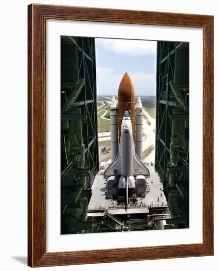 The Space Shuttle Discovery Begins Its Six Hour Trek from the Vehicle Assembly Building-null-Framed Photographic Print