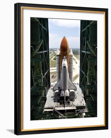 The Space Shuttle Discovery Begins Its Six Hour Trek from the Vehicle Assembly Building-null-Framed Photographic Print