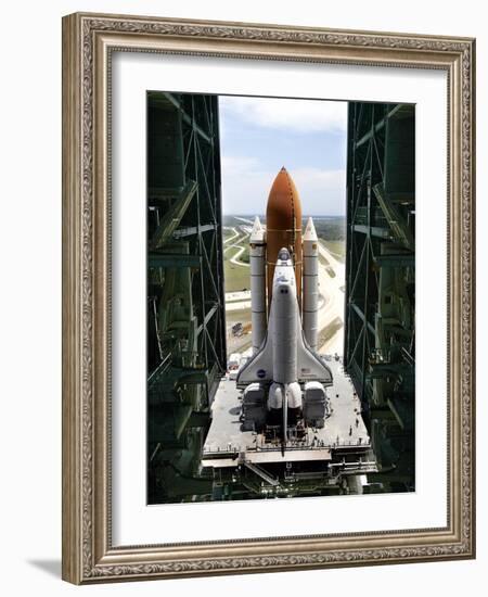 The Space Shuttle Discovery Begins Its Six Hour Trek from the Vehicle Assembly Building-null-Framed Photographic Print