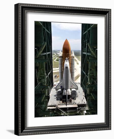 The Space Shuttle Discovery Begins Its Six Hour Trek from the Vehicle Assembly Building-null-Framed Photographic Print