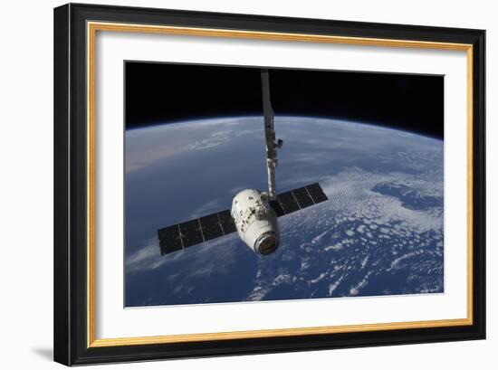 The Spacex Dragon Cargo Craft Prior to Being Released by the Canadarm2 Robotic Arm-null-Framed Photographic Print