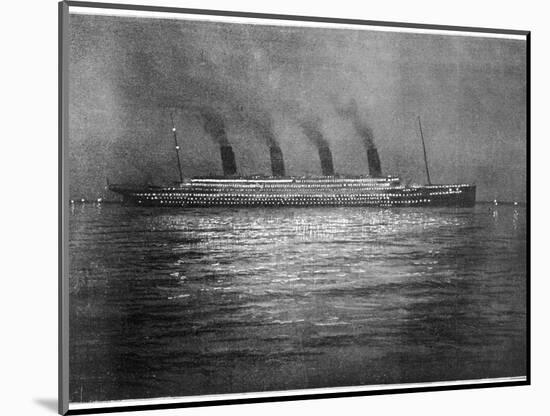 The Ss Titanic Seen at Night Whilst Visiting Cherbourg on the Evening of 10th April 1912-null-Mounted Photographic Print
