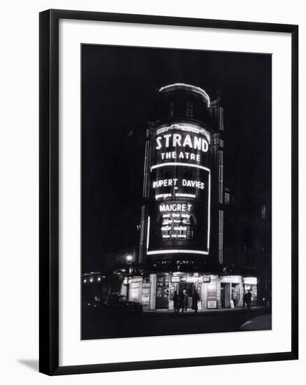 The Strand Theatre, London is Lit up at Night to Advertise the Play Maigret Starring Rupert Davies-null-Framed Photographic Print