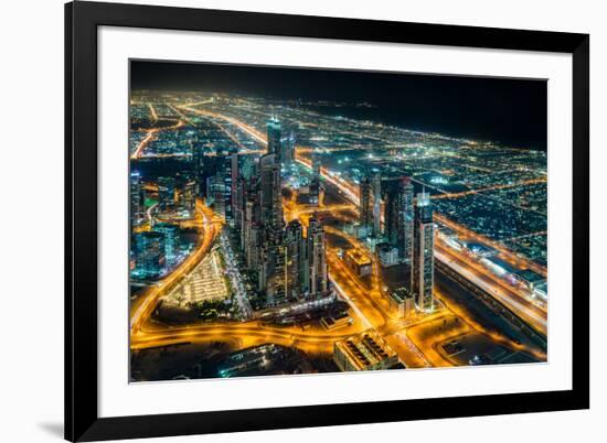 The street lights and skyscrapers of Dubai from high above the city, Dubai, United Arab Emirates-Logan Brown-Framed Photographic Print