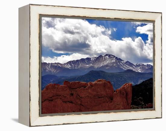 The Sun Breaks Through the Clouds to Highlight the Summit of Pikes Peak-null-Framed Premier Image Canvas