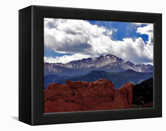 The Sun Breaks Through the Clouds to Highlight the Summit of Pikes Peak-null-Framed Premier Image Canvas