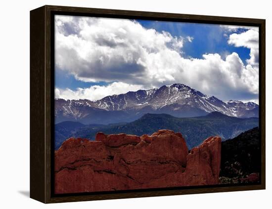 The Sun Breaks Through the Clouds to Highlight the Summit of Pikes Peak-null-Framed Premier Image Canvas