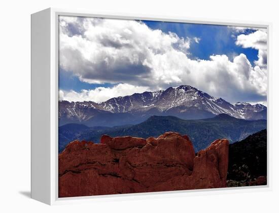 The Sun Breaks Through the Clouds to Highlight the Summit of Pikes Peak-null-Framed Premier Image Canvas