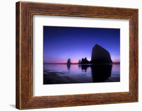 The Sun Sets Behind Haystack Rock at Cannon Beach, Oregon-Ben Coffman-Framed Photographic Print