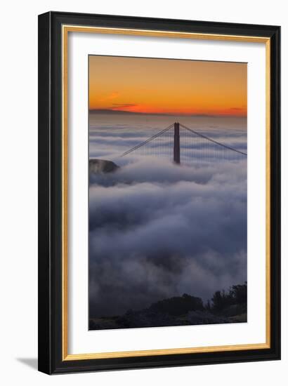 The Sunrise Of A Foggy San Francisco Bay And The North Tower Of The Golden Gate Bridge-Joe Azure-Framed Photographic Print