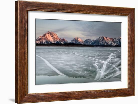 The Sunrises Over The Tetons And An Ice Covered Jackson Lake In Grand Teton National Park, Wyoming-Jay Goodrich-Framed Photographic Print