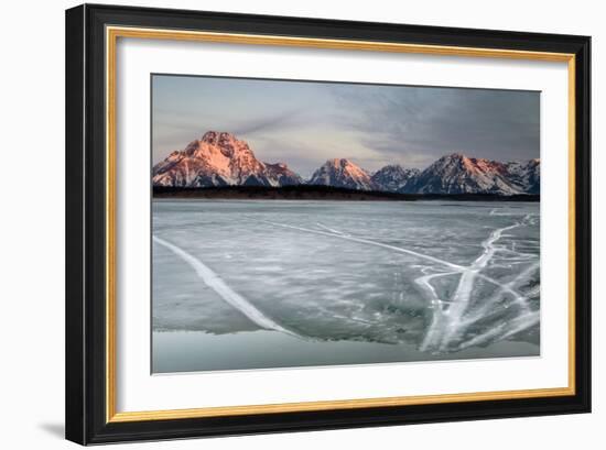 The Sunrises Over The Tetons And An Ice Covered Jackson Lake In Grand Teton National Park, Wyoming-Jay Goodrich-Framed Photographic Print