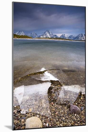 The Sunrises Over The Tetons And An Ice Covered Jackson Lake In Grand Teton National Park, Wyoming-Jay Goodrich-Mounted Photographic Print