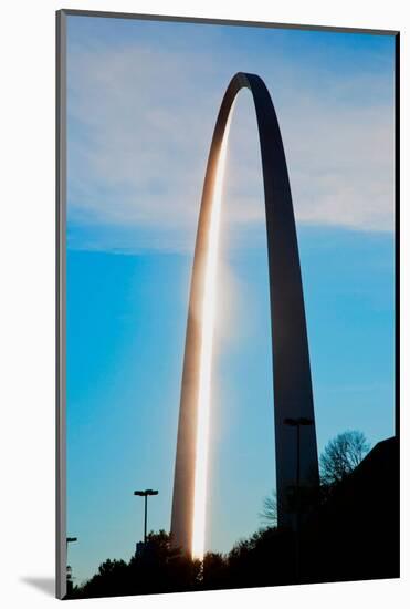The sunset reflects on the majestic Gateway Arch, the Jefferson National Expansion Memorial, the...-null-Mounted Photographic Print