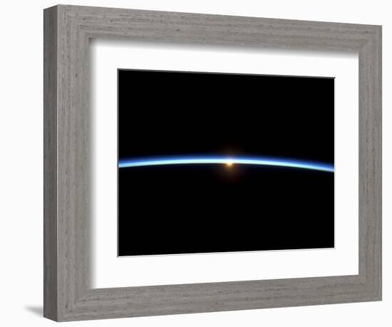 The Thin Line of Earth's Atmosphere and the Setting Sun-null-Framed Photographic Print