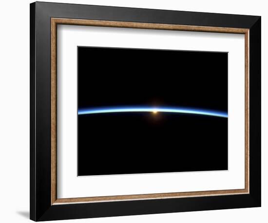 The Thin Line of Earth's Atmosphere and the Setting Sun-null-Framed Photographic Print