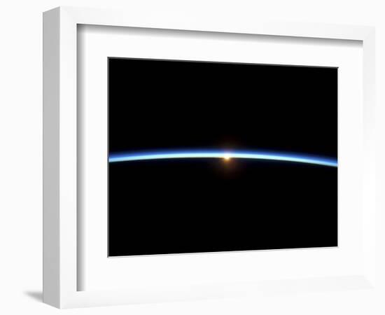 The Thin Line of Earth's Atmosphere and the Setting Sun-null-Framed Photographic Print