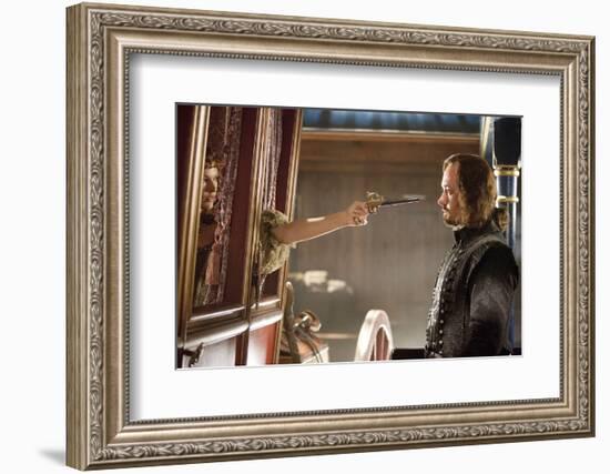 THE THREE MUSKETEERS (L-R) MILLA JOVOVICH and MATTHEW MACFADYEN star in THE THREE MUSKETEERS 3D. (p-null-Framed Photo