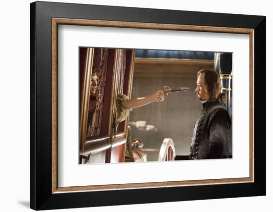 THE THREE MUSKETEERS (L-R) MILLA JOVOVICH and MATTHEW MACFADYEN star in THE THREE MUSKETEERS 3D. (p-null-Framed Photo