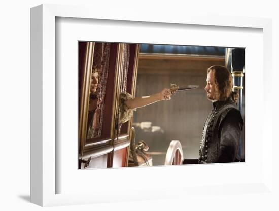 THE THREE MUSKETEERS (L-R) MILLA JOVOVICH and MATTHEW MACFADYEN star in THE THREE MUSKETEERS 3D. (p-null-Framed Photo