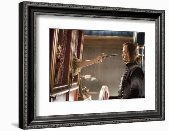 THE THREE MUSKETEERS (L-R) MILLA JOVOVICH and MATTHEW MACFADYEN star in THE THREE MUSKETEERS 3D. (p-null-Framed Photo