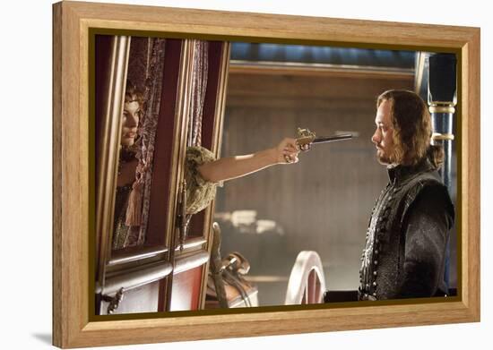 THE THREE MUSKETEERS (L-R) MILLA JOVOVICH and MATTHEW MACFADYEN star in THE THREE MUSKETEERS 3D. (p-null-Framed Stretched Canvas