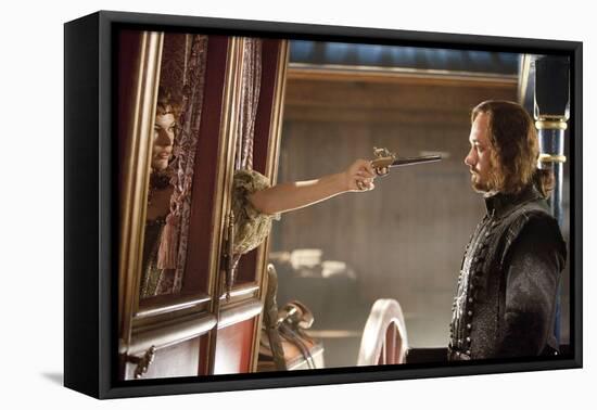 THE THREE MUSKETEERS (L-R) MILLA JOVOVICH and MATTHEW MACFADYEN star in THE THREE MUSKETEERS 3D. (p-null-Framed Stretched Canvas