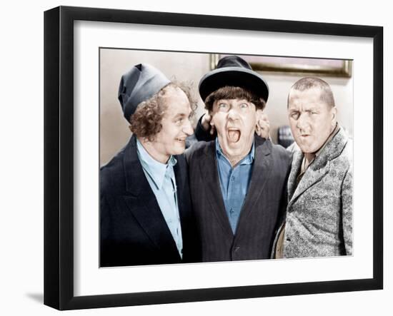 The Three Stooges, from left: Larry Fine, Moe Howard, Curly Howard, ca. 1943-null-Framed Photo