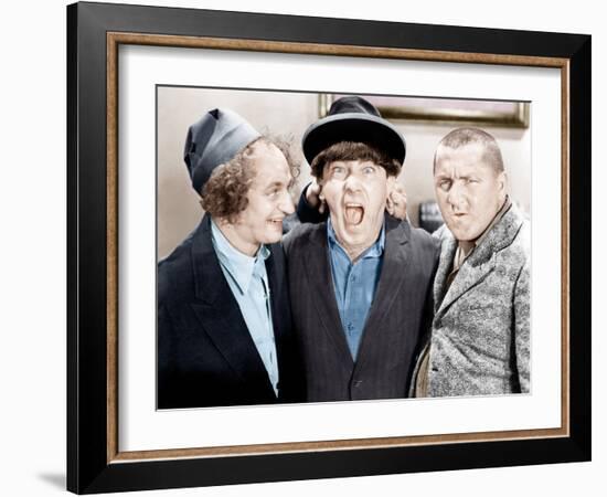 The Three Stooges, from left: Larry Fine, Moe Howard, Curly Howard, ca. 1943-null-Framed Photo