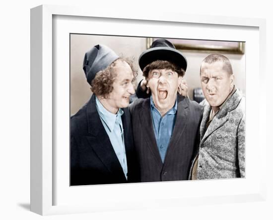 The Three Stooges, from left: Larry Fine, Moe Howard, Curly Howard, ca. 1943-null-Framed Photo