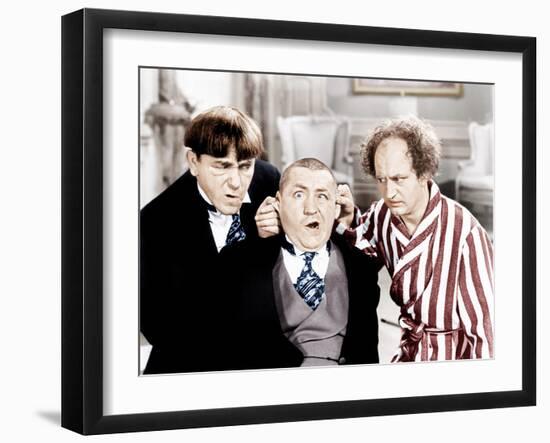 The Three Stooges, from left: Moe Howard, Curly Howard, Larry Fine, ca. 1940s-null-Framed Photo