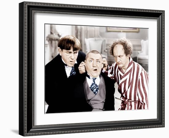 The Three Stooges, from left: Moe Howard, Curly Howard, Larry Fine, ca. 1940s-null-Framed Photo