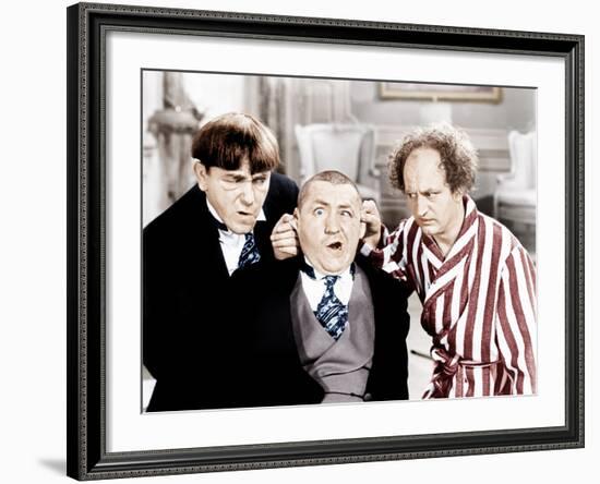 The Three Stooges, from left: Moe Howard, Curly Howard, Larry Fine, ca. 1940s-null-Framed Photo