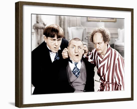 The Three Stooges, from left: Moe Howard, Curly Howard, Larry Fine, ca. 1940s-null-Framed Photo