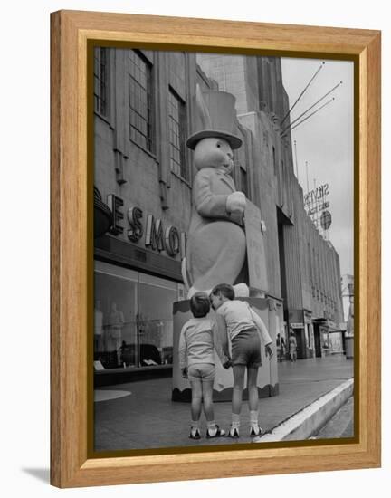 The Toll Brothers Admiring 6 Ft. Easter Bunny-Bob Landry-Framed Premier Image Canvas