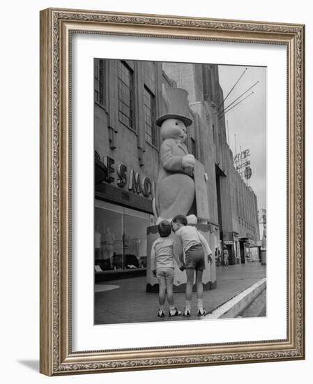 The Toll Brothers Admiring 6 Ft. Easter Bunny-Bob Landry-Framed Photographic Print