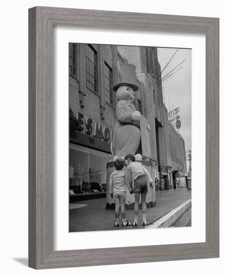 The Toll Brothers Admiring 6 Ft. Easter Bunny-Bob Landry-Framed Photographic Print