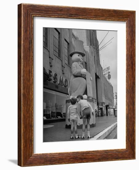 The Toll Brothers Admiring 6 Ft. Easter Bunny-Bob Landry-Framed Photographic Print