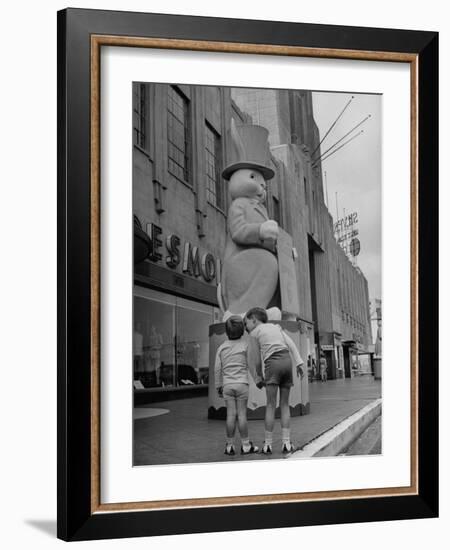 The Toll Brothers Admiring 6 Ft. Easter Bunny-Bob Landry-Framed Photographic Print