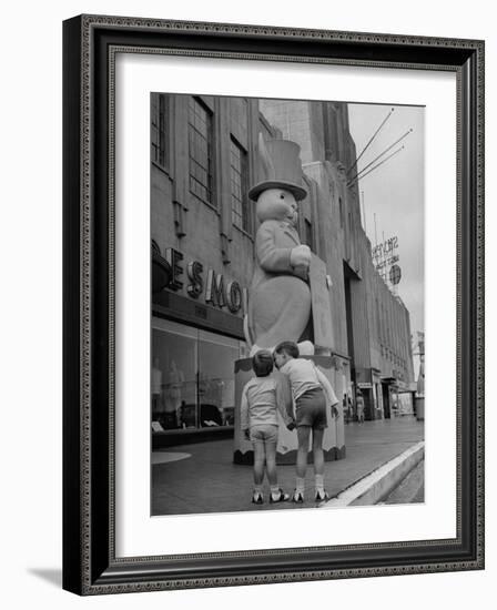 The Toll Brothers Admiring 6 Ft. Easter Bunny-Bob Landry-Framed Photographic Print