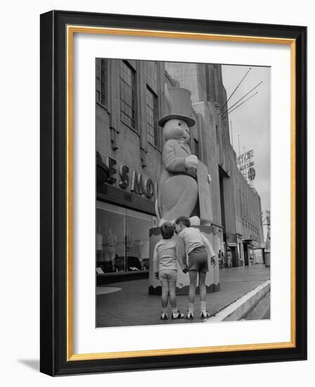 The Toll Brothers Admiring 6 Ft. Easter Bunny-Bob Landry-Framed Photographic Print