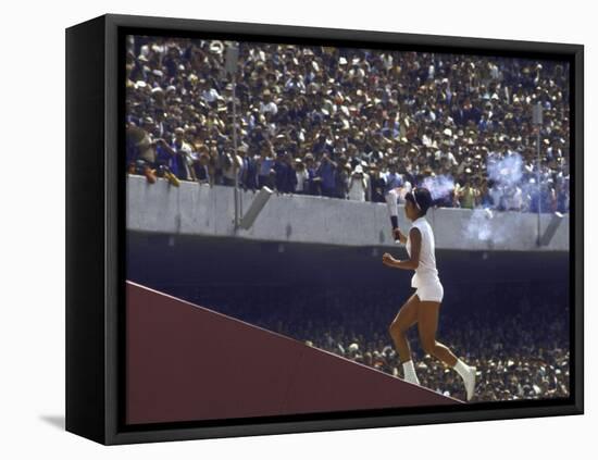 The Torch Being Carried Up the Steps in the Olympic Stadium at the Summer Olympics-John Dominis-Framed Premier Image Canvas