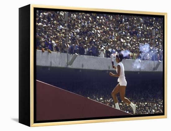 The Torch Being Carried Up the Steps in the Olympic Stadium at the Summer Olympics-John Dominis-Framed Premier Image Canvas