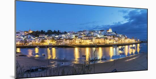 The traditional fishing village of Ferragudo at dusk. Algarve, Portugal-Mauricio Abreu-Mounted Photographic Print