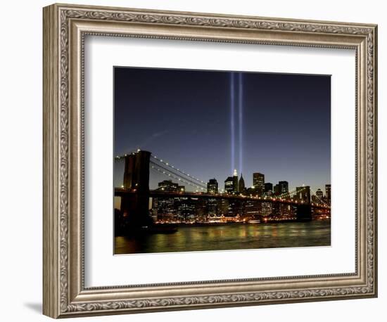 The Tribute of Light Memorial Shines into the Sky Over the Night Skyline of New York City-null-Framed Photographic Print